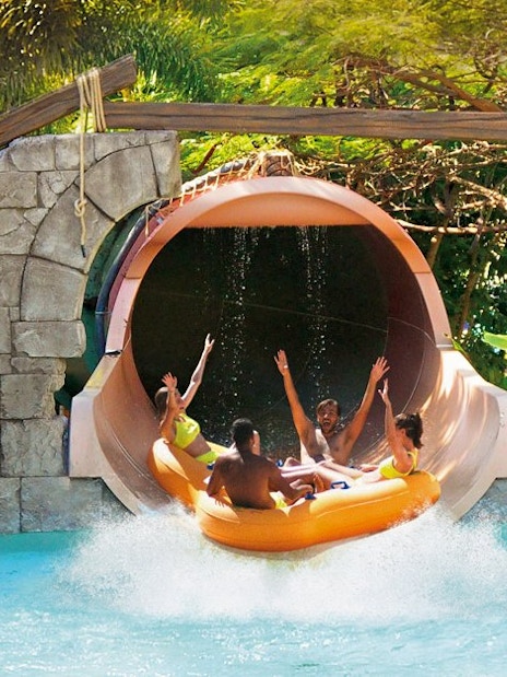 Visitors enjoying Anaconda water slide at Aqualand Maspalomas.