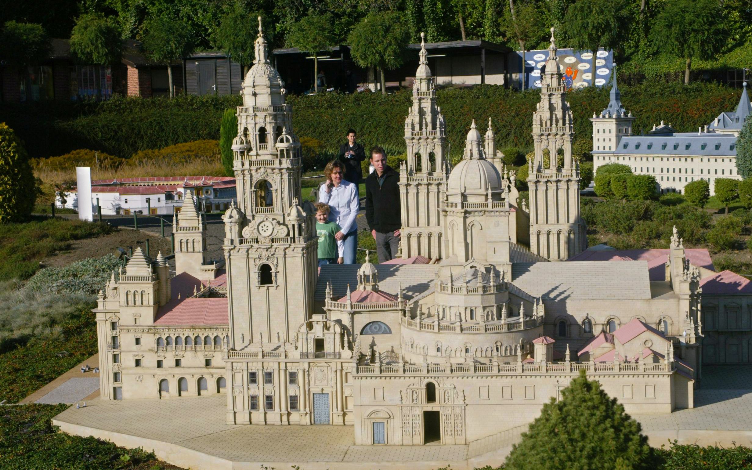 Mini-Europe model of Santiago de Compostela Cathedral with visitors in Brussels.