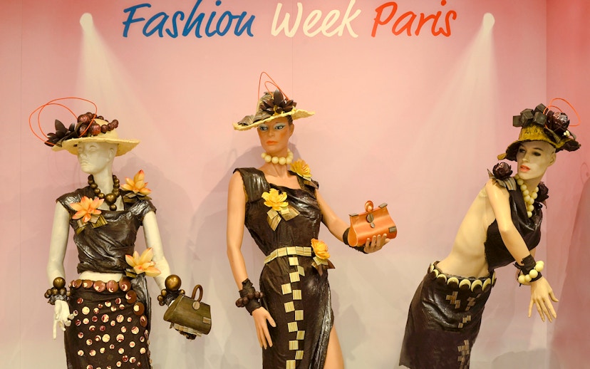 Mannequins in chocolate-themed fashion at Chocolate Museum Paris exhibit.