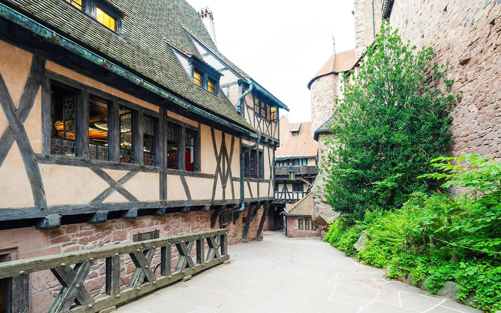Medieval timber-framed alley inside Haut Koenigsbourg Castle, France.