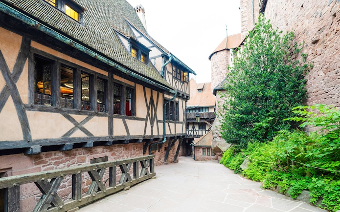 Medieval timber-framed alley inside Haut Koenigsbourg Castle, France.