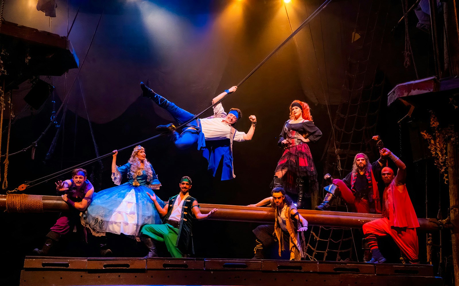 Pirates performing on stage at the Pirates Dinner Adventure Show.