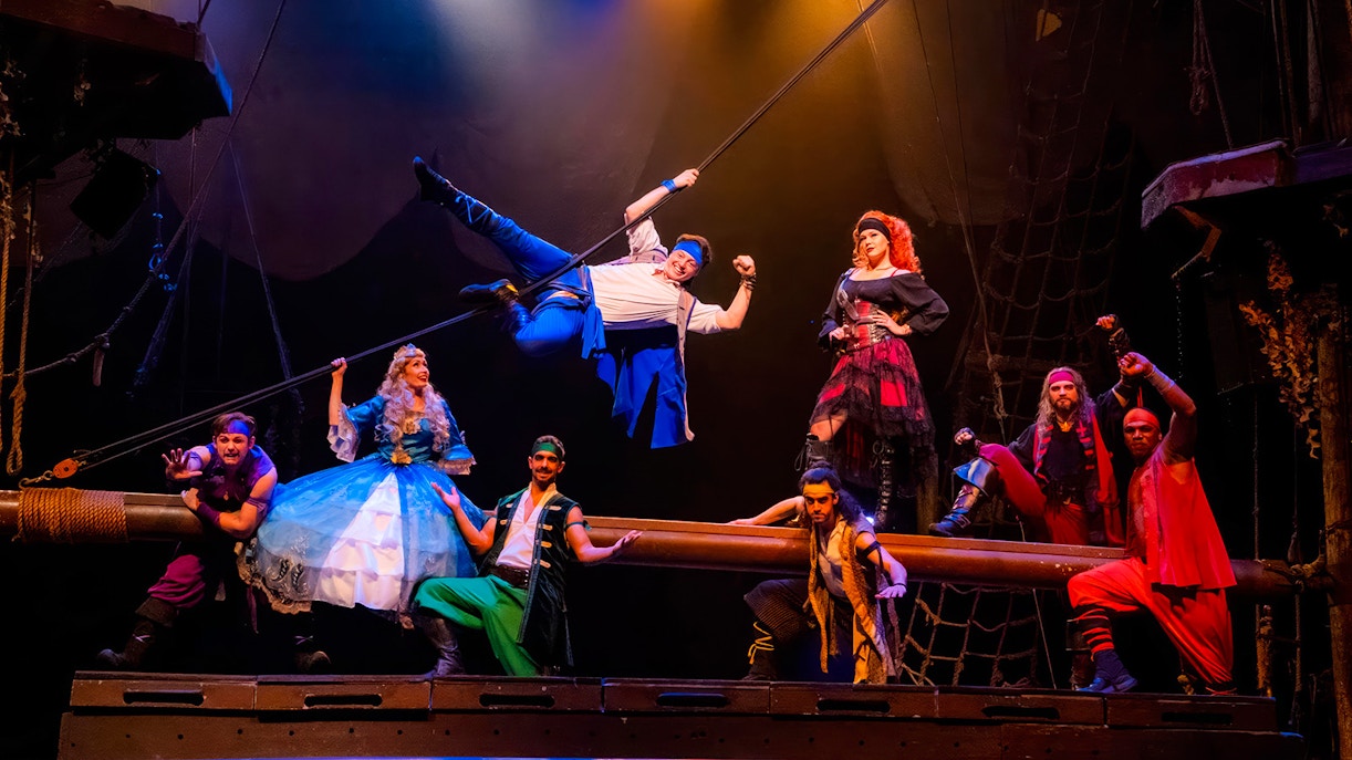 Pirates performing on stage at the Pirates Dinner Adventure Show.