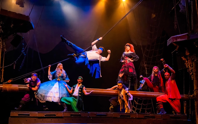 Pirates performing on stage at the Pirates Dinner Adventure Show.