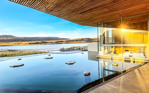 Vök Baths geothermal pool with lake view in Egilsstaðir, Iceland.
