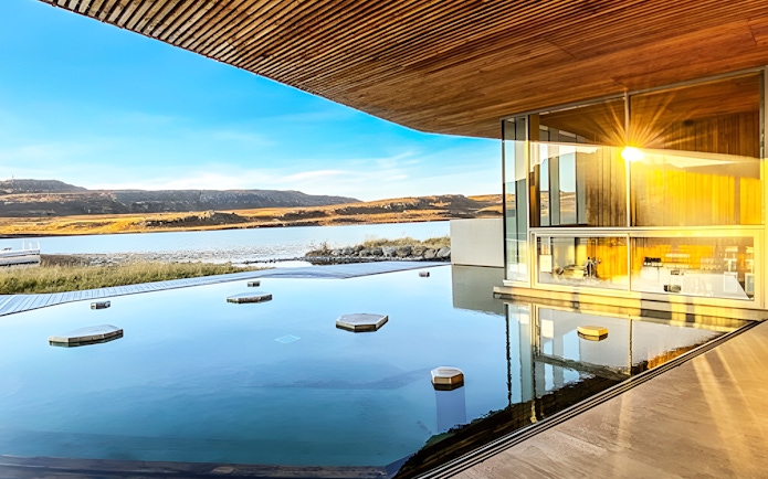 Vök Baths geothermal pool with lake view in Egilsstaðir, Iceland.