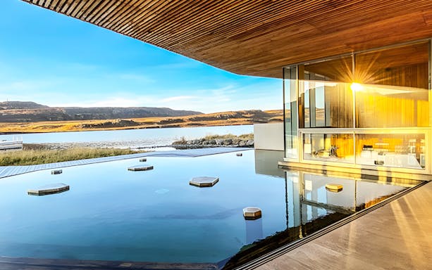 Vök Baths geothermal pool with lake view in Egilsstaðir, Iceland.