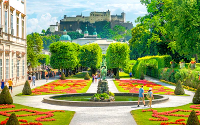 Mirabell Gardens with Hohensalzburg Fortress in Salzburg, Austria, featured on the Original Sound of Music Tour.