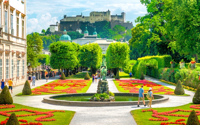 Mirabell Gardens with Hohensalzburg Fortress in Salzburg, Austria, featured on the Original Sound of Music Tour.