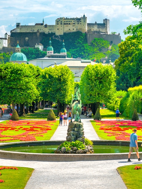 Mirabell Gardens with Hohensalzburg Fortress in Salzburg, Austria, featured on the Original Sound of Music Tour.