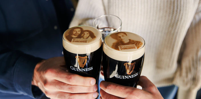 Guests enjoying personalized Stouties at Guinness Storehouse, Dublin.