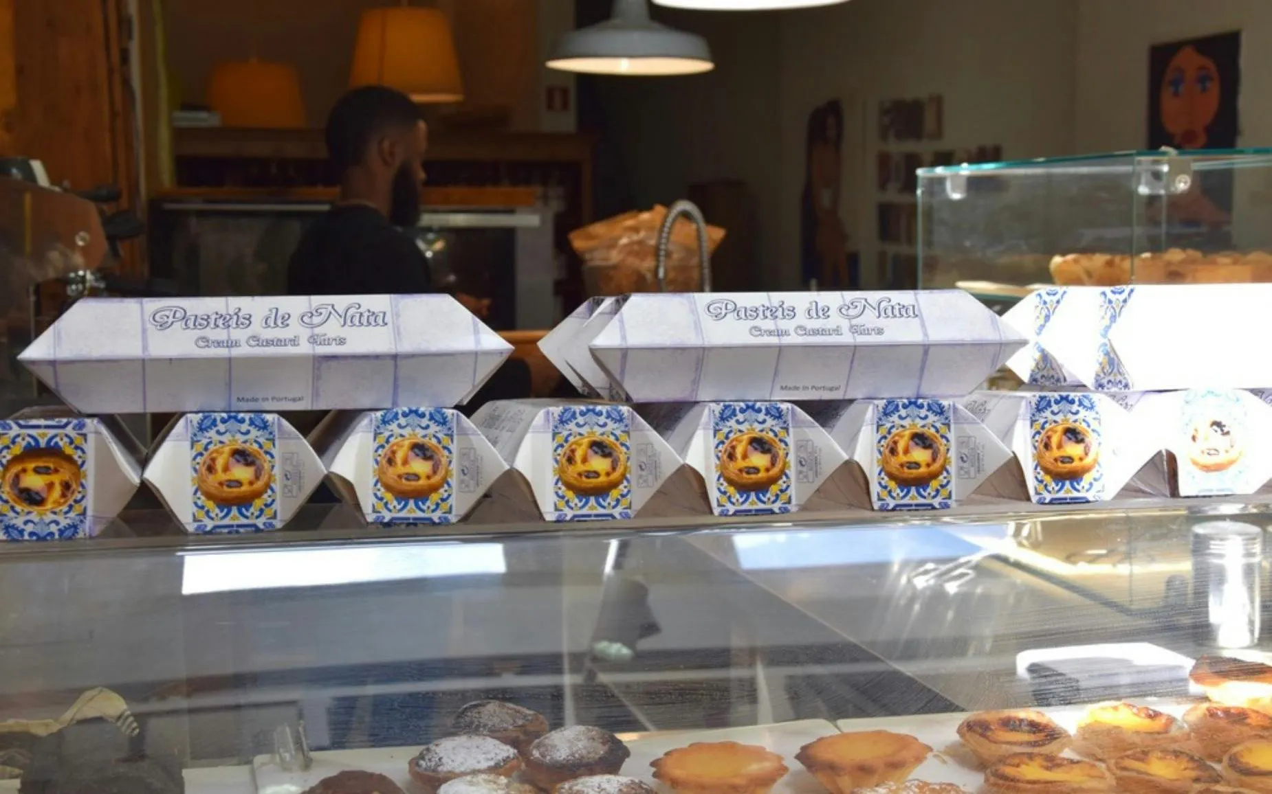 Pastries de Nata boxes displayed in a Haarlem bakery during a food tour.