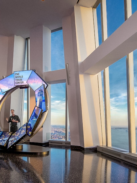 One World Observatory view of New York City skyline with City Pulse exhibit.