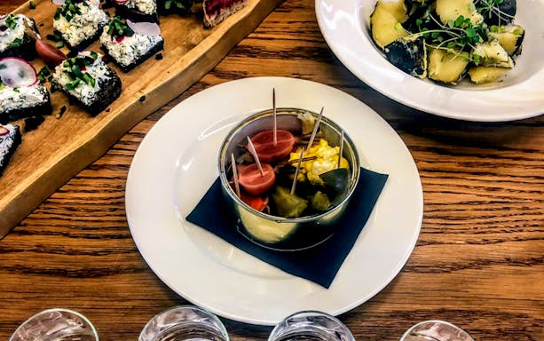 Vodka tasting snacks with pickles and appetizers in Wroclaw.