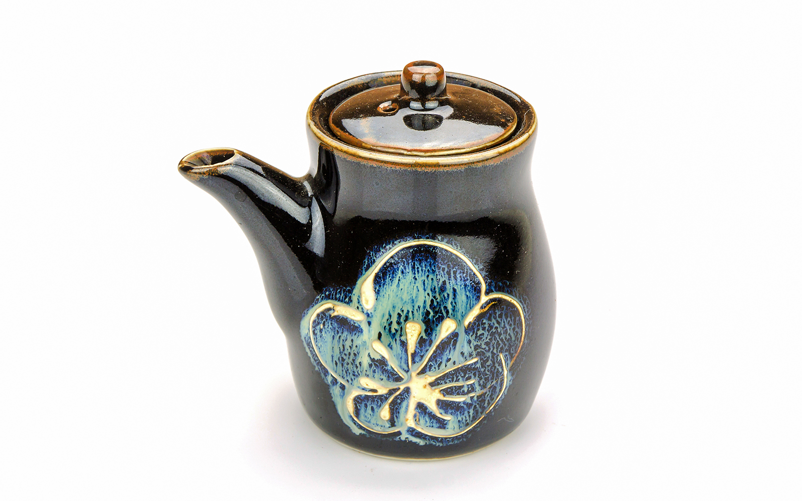 Japanese ceramic teapot with floral design.