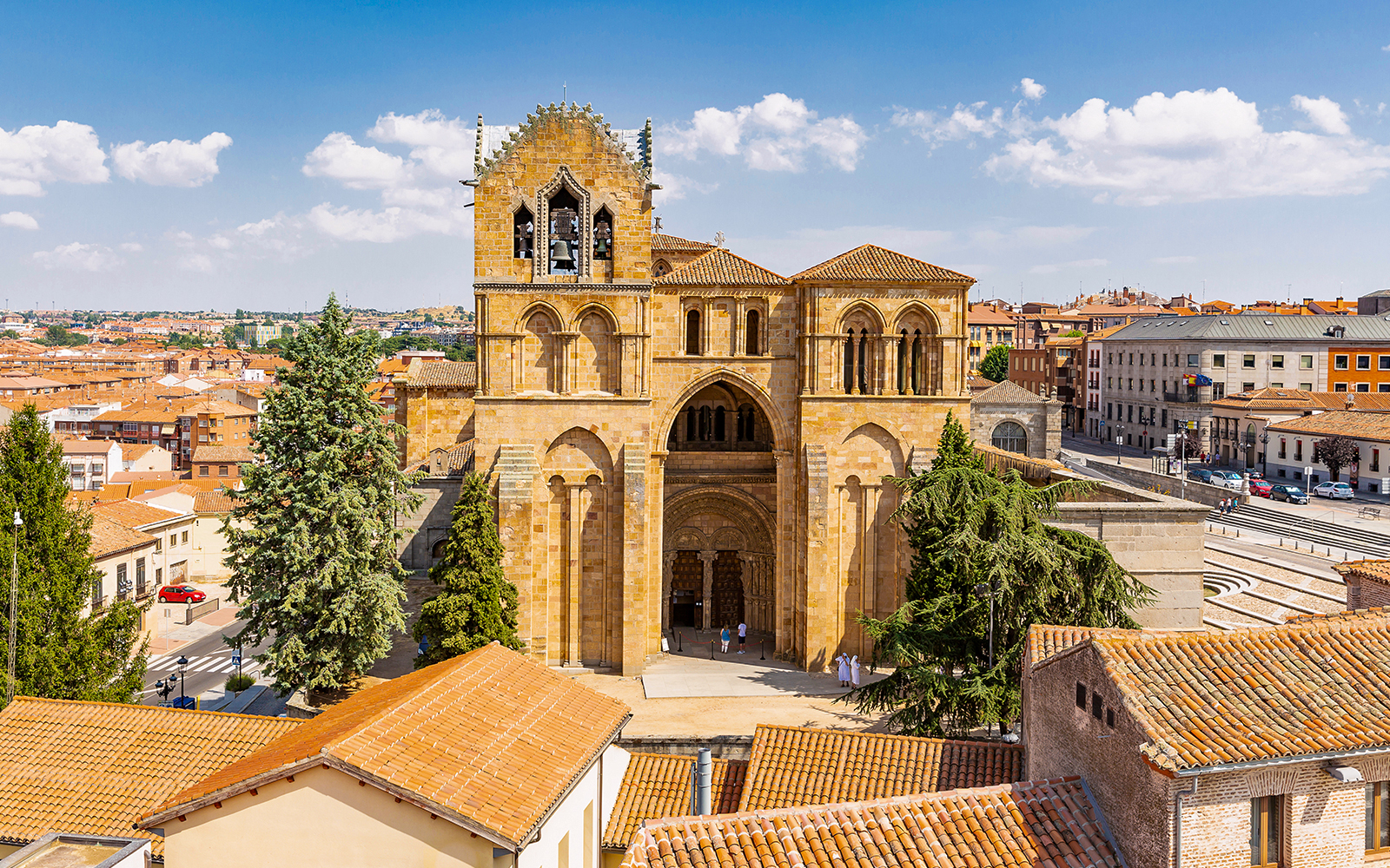 Avila cityscape with San Vicente Basilica in the foreground.