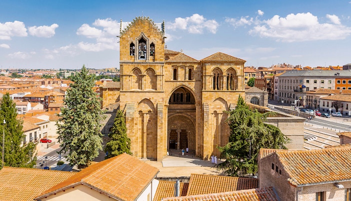 Avila cityscape with San Vicente Basilica in the foreground.