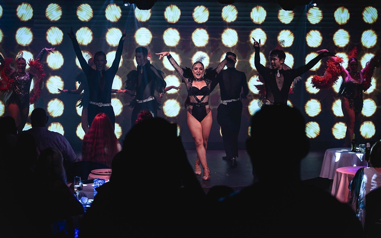 Cabaret dancers performing at La Scène Dinner Show in Prague.