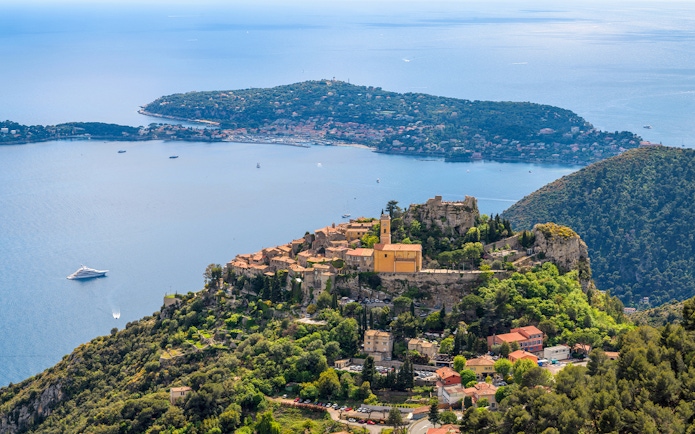 Aerial view of Eze, France, highlighting medieval architecture and coastal scenery.