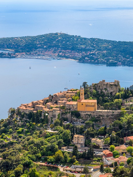 Aerial view of Eze, France, highlighting medieval architecture and coastal scenery.