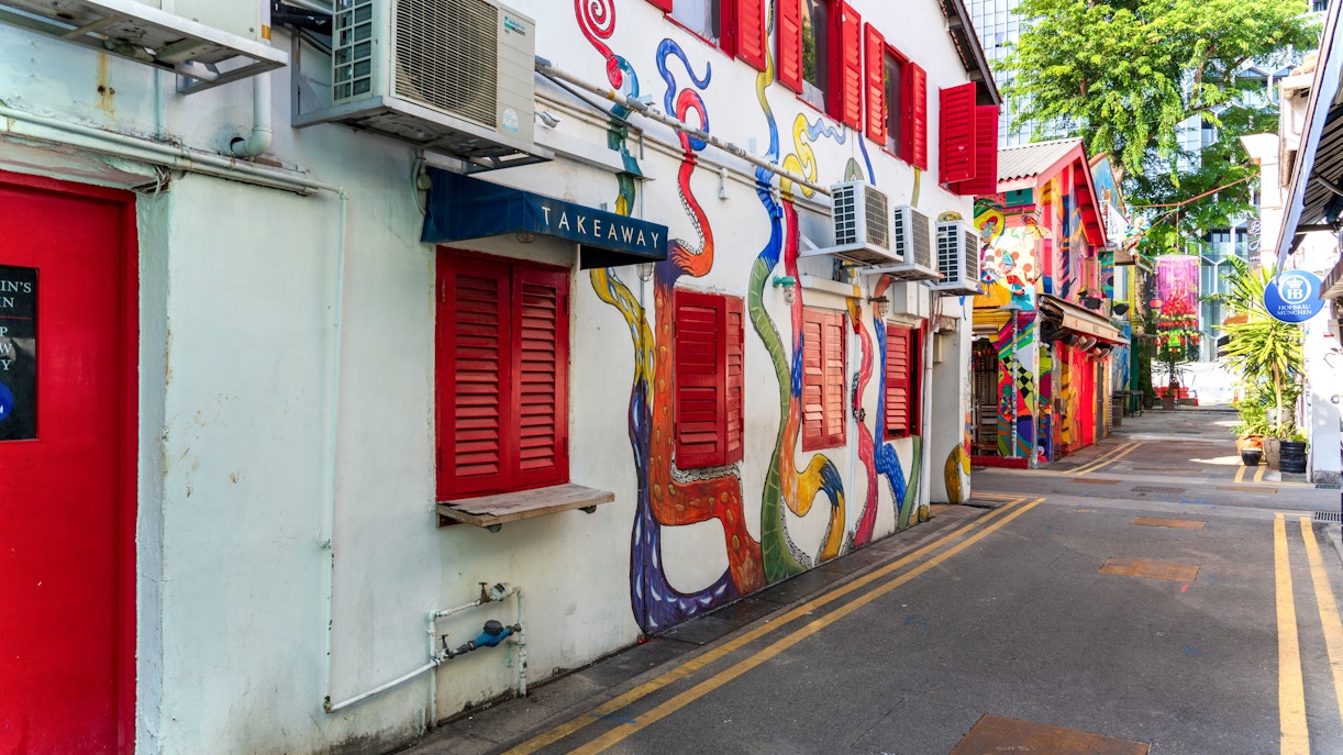 Colorful street art and boutique shops on Haji Lane, Singapore.