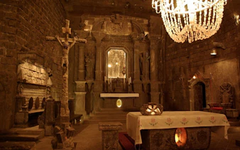 Wieliczka Salt Mine chapel interior with altar and salt carvings, Krakow tour.