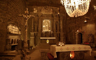 Wieliczka Salt Mine chapel interior with altar and salt carvings, Krakow tour.