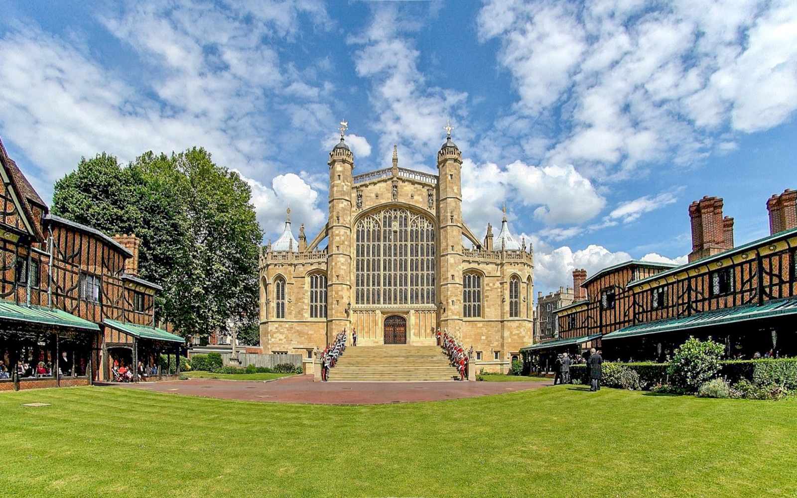 St George's Chapel at Windsor Castle with ceremonial guards on steps.