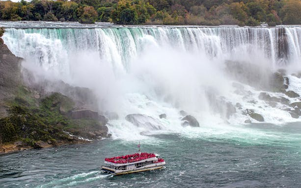 Cruise boat with passengers near Niagara Falls.