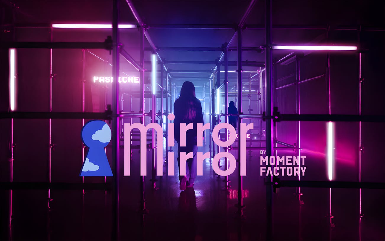 Mirror Mirror exhibit at ArtScience Museum with neon lights and reflective surfaces.