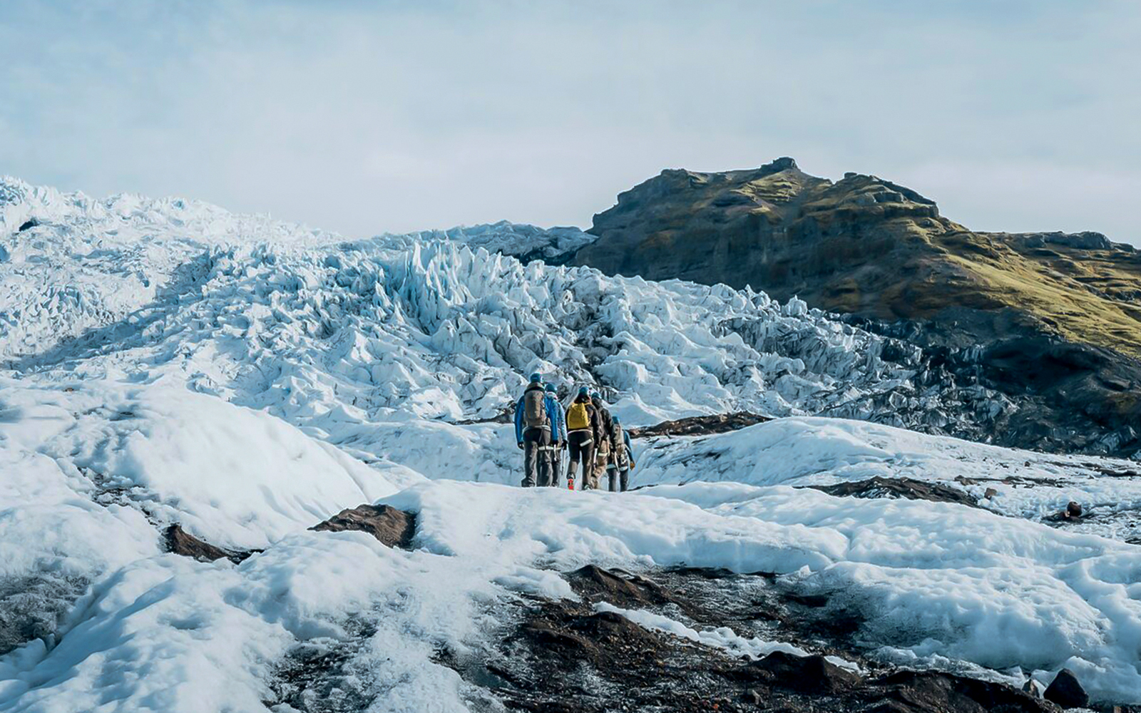 Guests exploring ice maze and glacier crevasses in Skaftafell, Iceland.