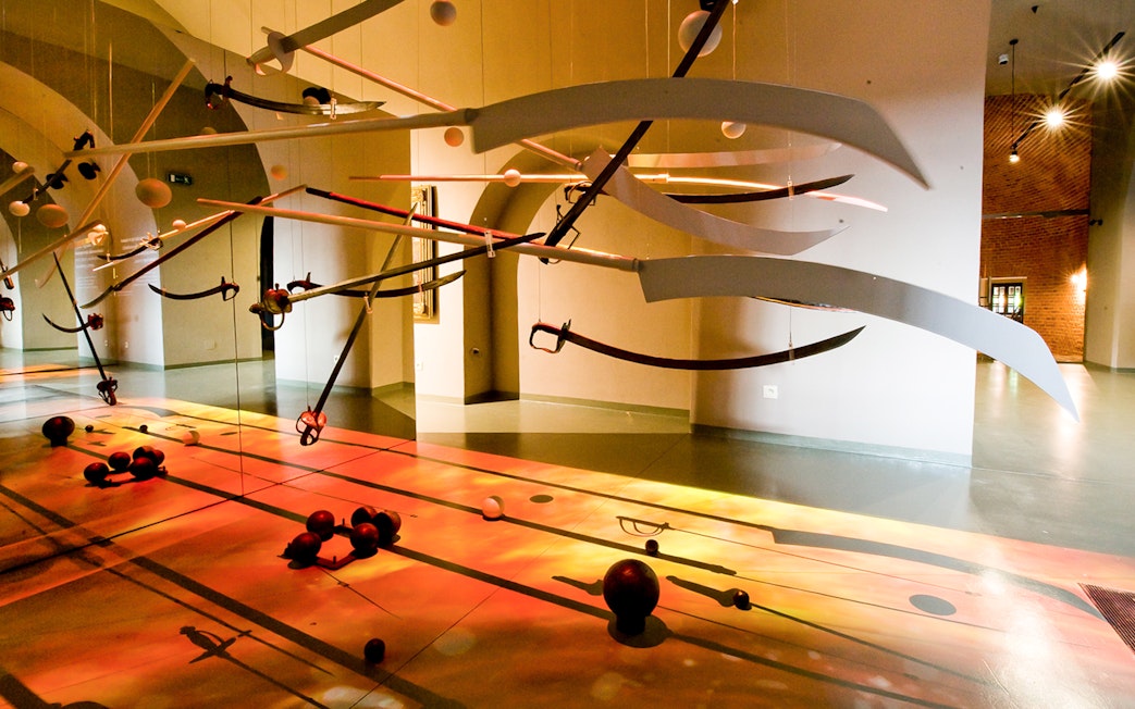 Swords and artifacts displayed inside Kościuszko Mound, Krakow.
