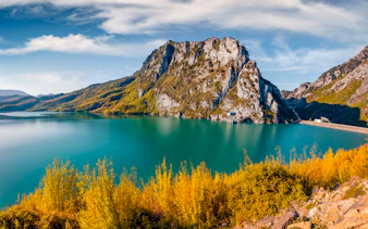 Gamti Mountain view with Bovilla Lake during hiking tour.