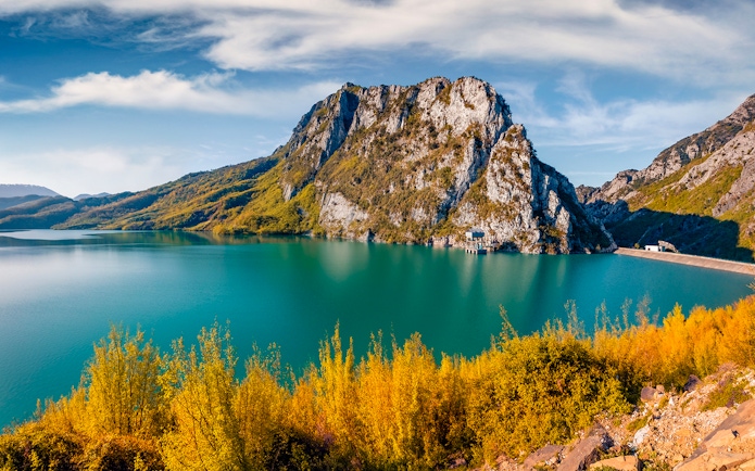 Gamti Mountain view with Bovilla Lake during hiking tour.