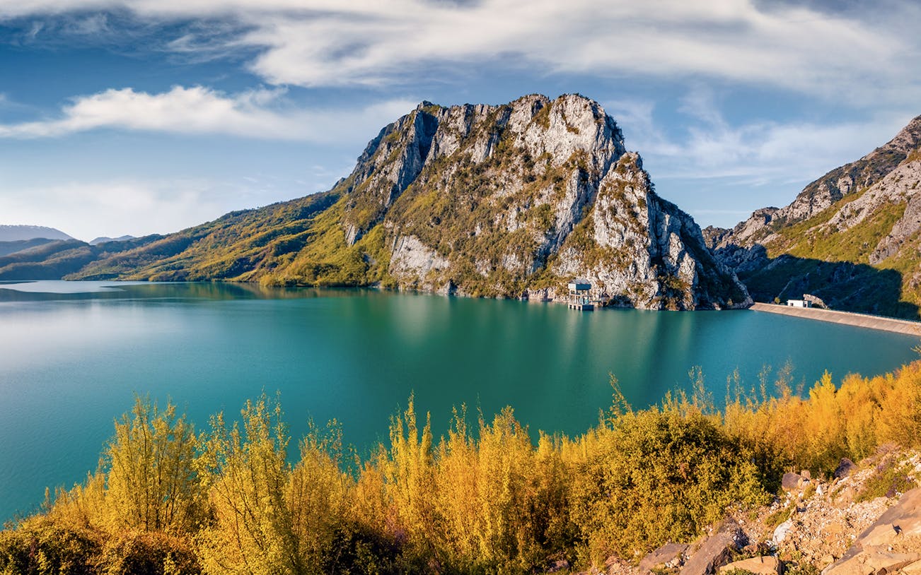 Gamti Mountain view with Bovilla Lake during hiking tour.