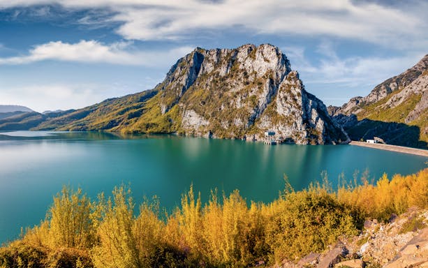 Gamti Mountain view with Bovilla Lake during hiking tour.