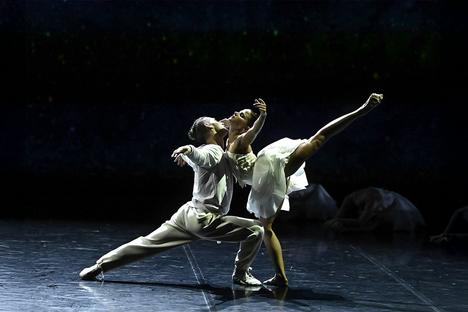 Dancers performing Ballet Preljocaj's Swan Lake on stage.