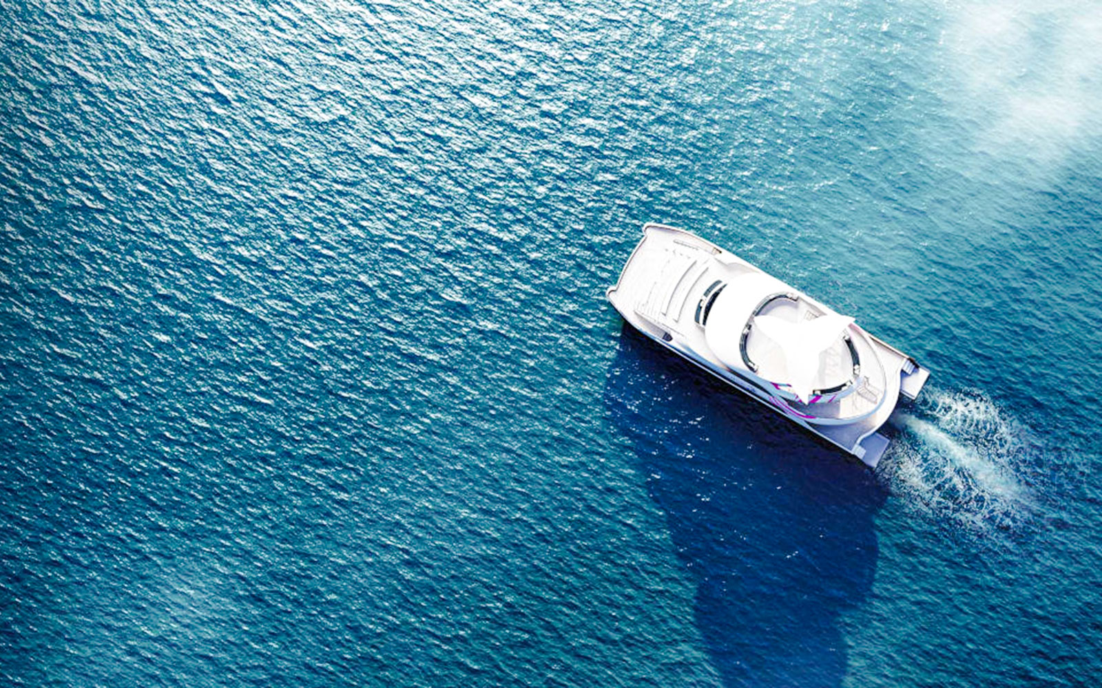 Aerial view of Spirit of Migloo cruise ship on open water, Journey Beyond Cruise.