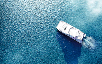 Aerial view of Spirit of Migloo cruise ship on open water, Journey Beyond Cruise.