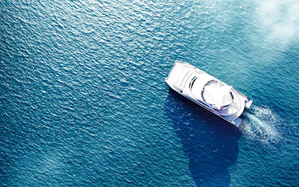 Aerial view of Spirit of Migloo cruise ship on open water, Journey Beyond Cruise.