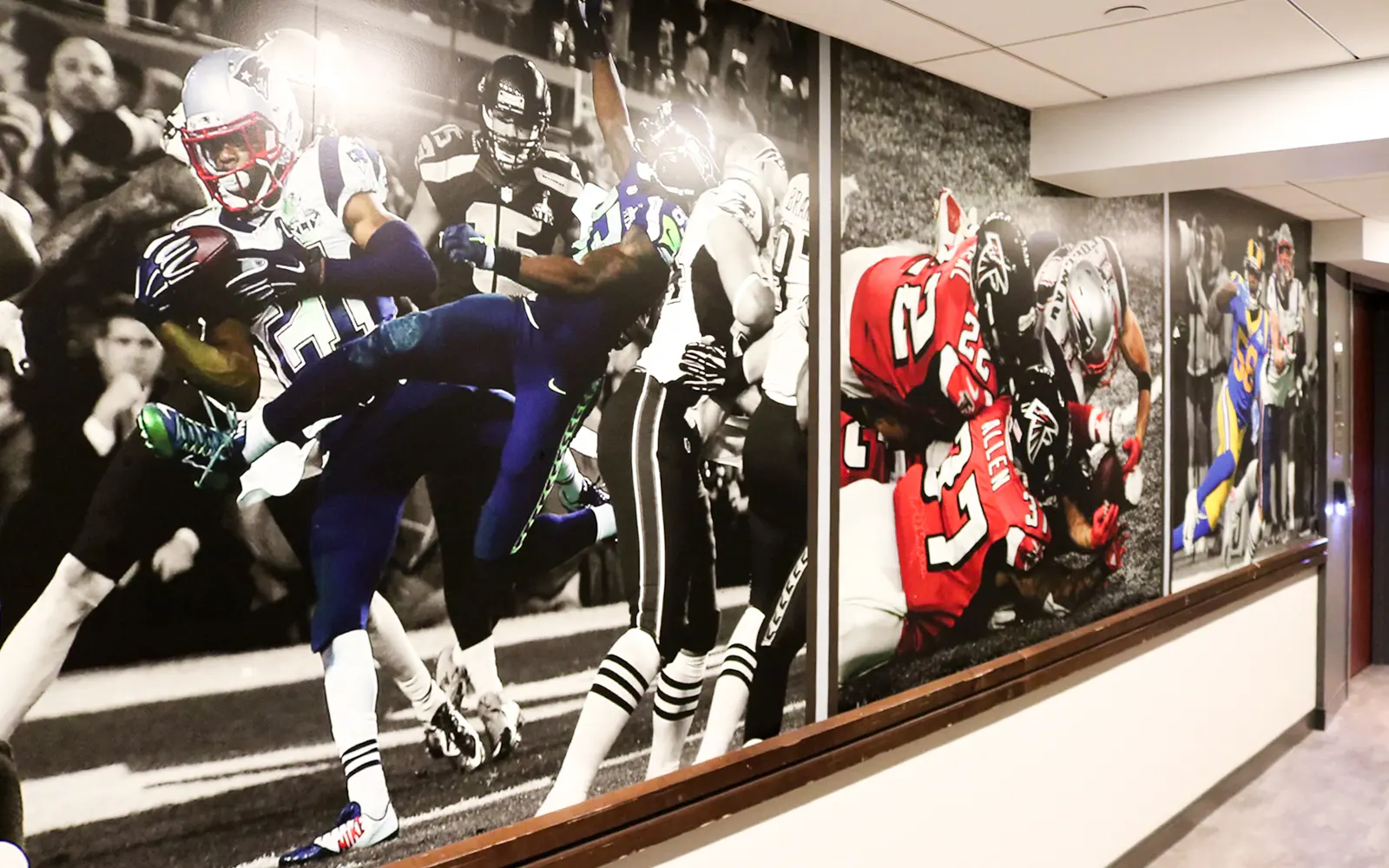 Football action murals at The Sports Museum, Boston.