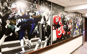 Football action murals at The Sports Museum, Boston.