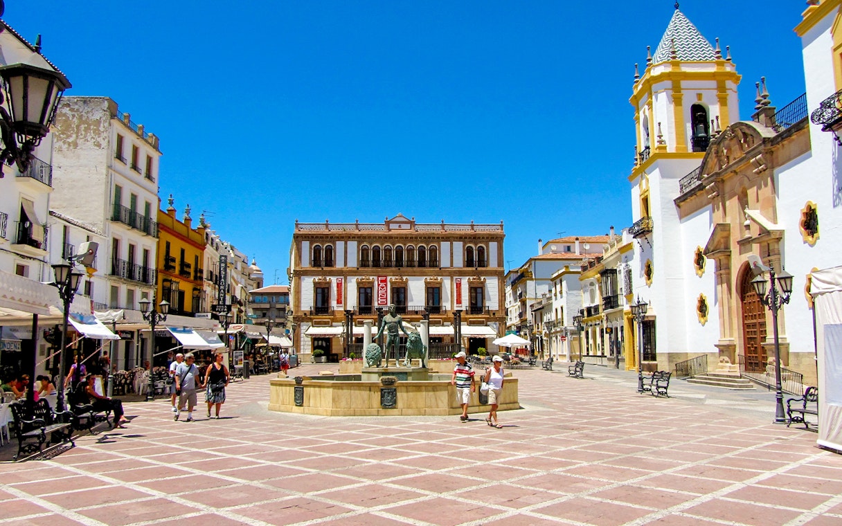 Plaza del Socorro in Ronda, Andalusia, featuring a central fountain and historic buildings.