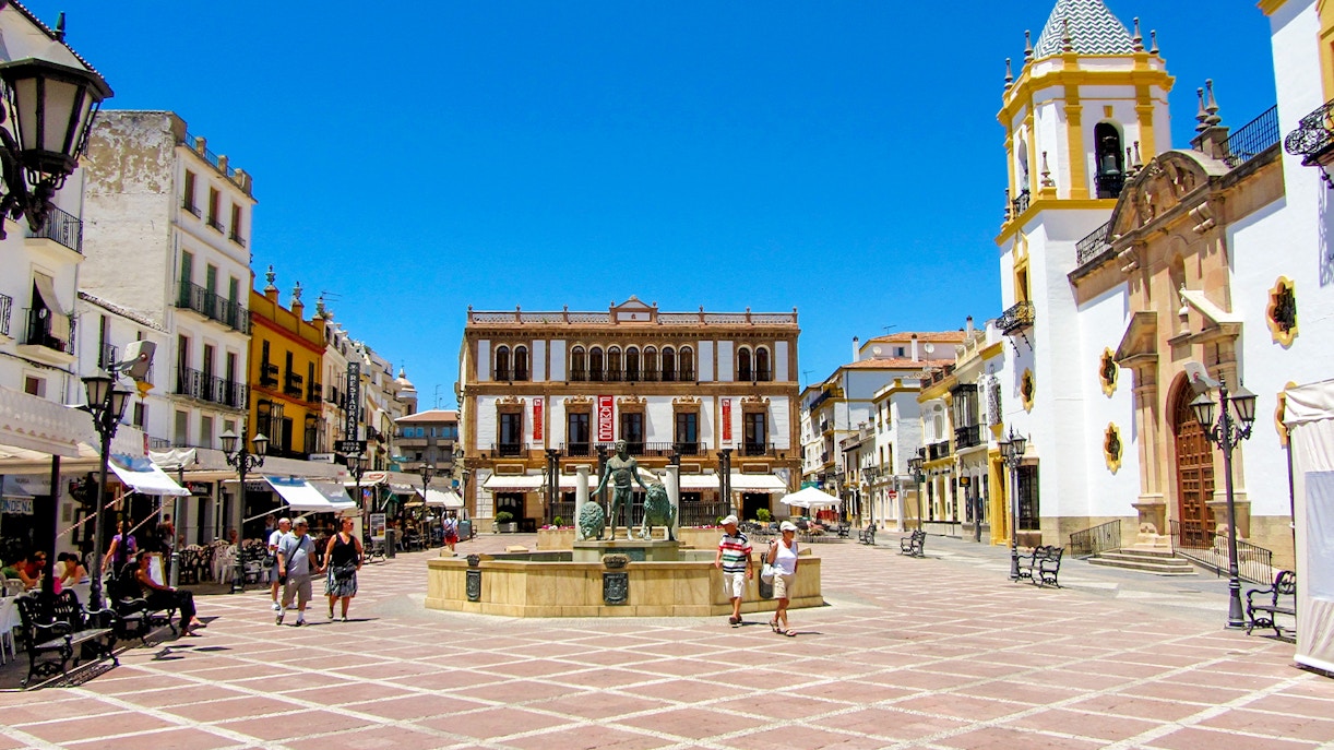 Plaza del Socorro in Ronda, Andalusia, featuring a central fountain and historic buildings.