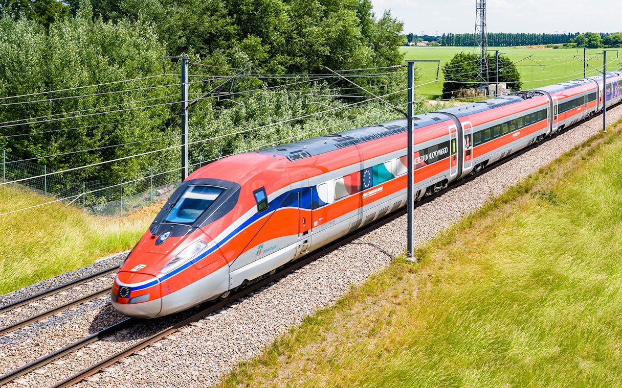 High-speed train on a scenic route, Eurail Global Continuous Pass, 1st Class Seats.