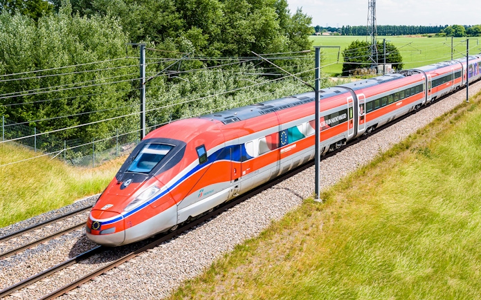 High-speed train on a scenic route, Eurail Global Continuous Pass, 1st Class Seats.