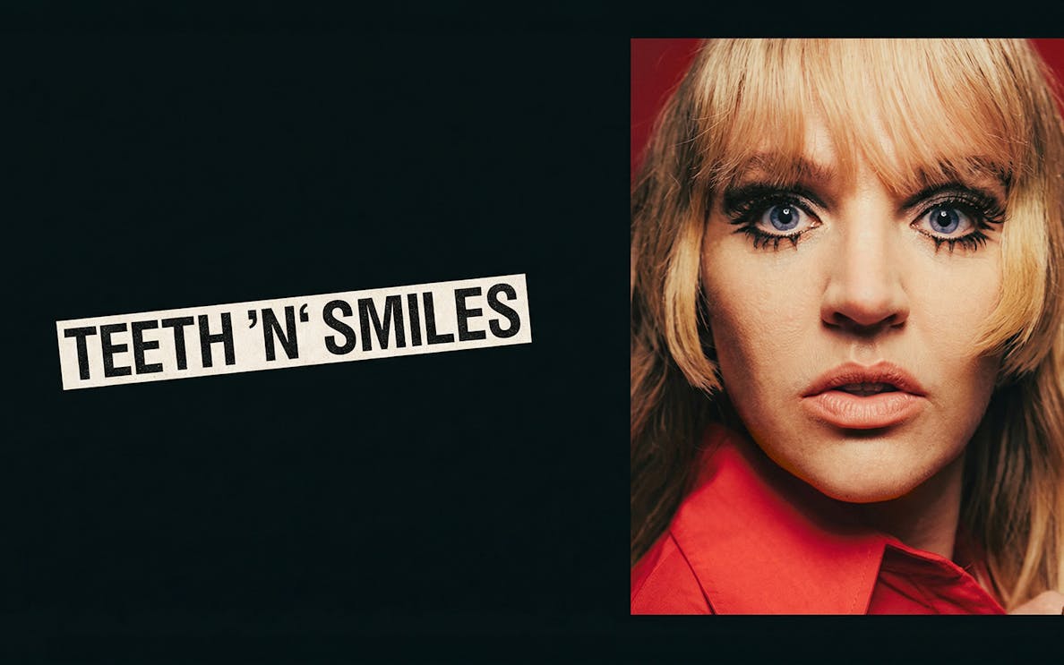 Teeth N Smiles text with close-up of a person in a red shirt