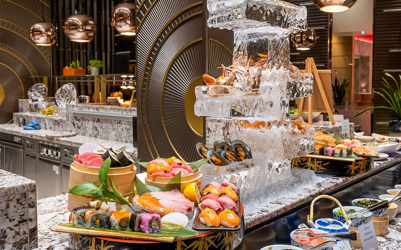 Sushi and seafood buffet display at Mundo Jumeirah Emirates Towers.