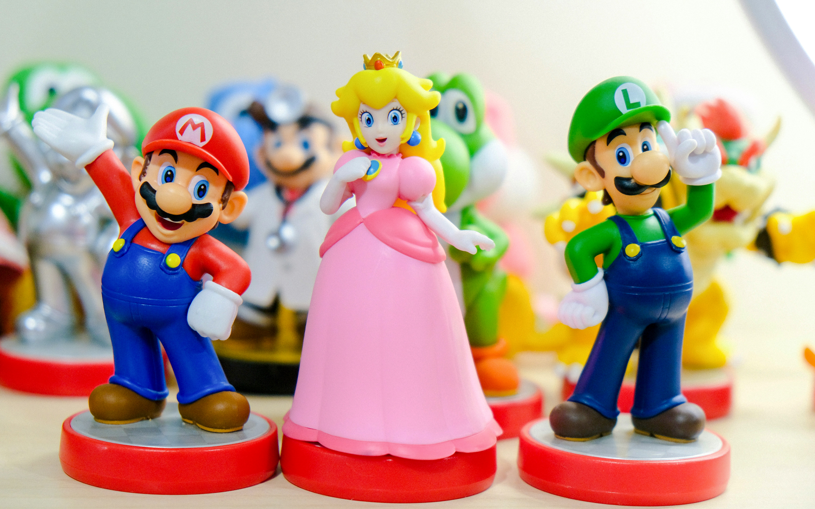 Mario-themed toys and merchandise display in a store.