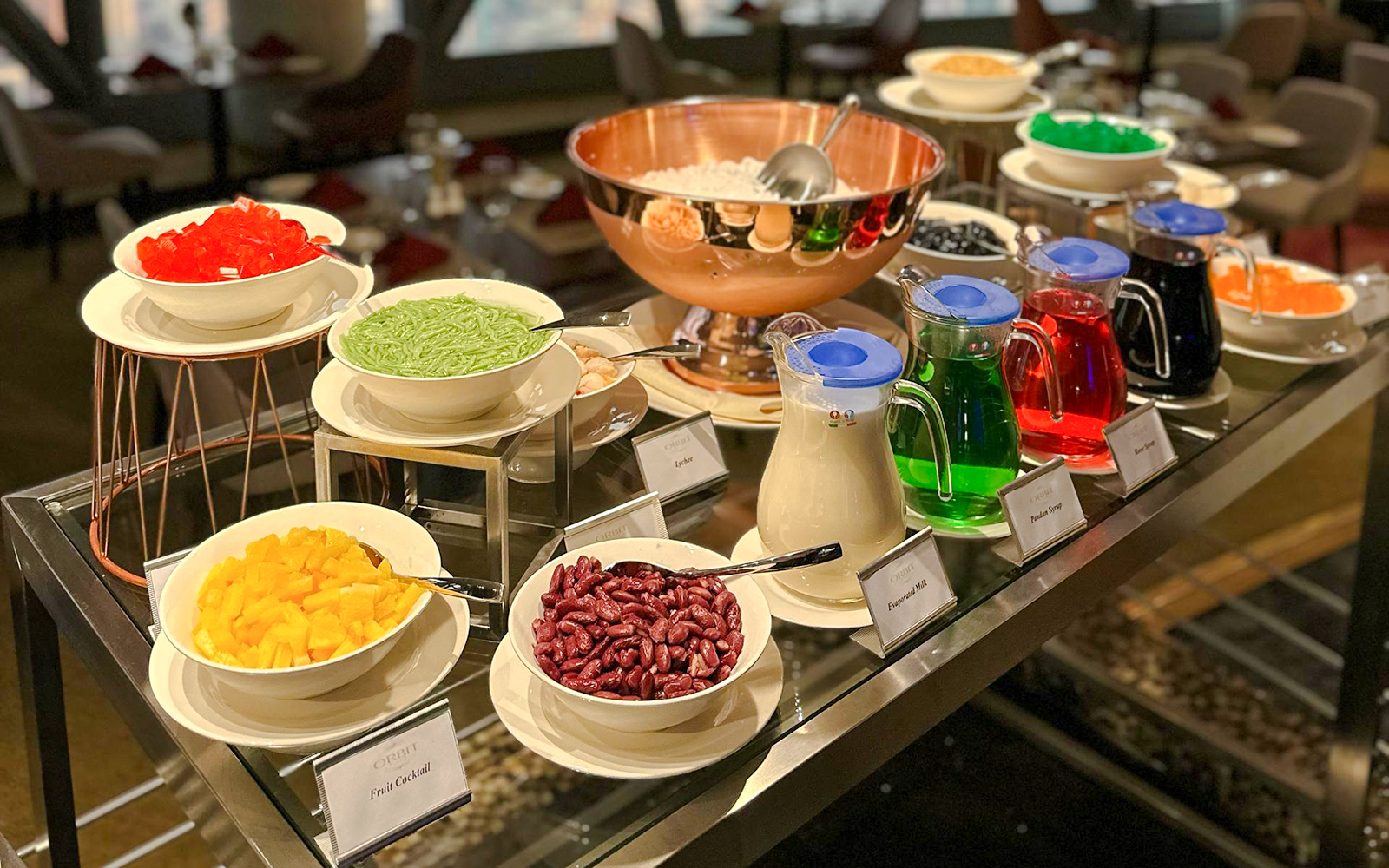 Lunch buffet with assorted desserts and drinks at ORBIT Revolving Dining, KL Tower.